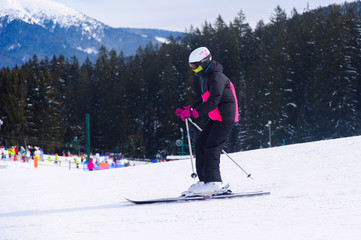Fototapeta na wymiar Dynamic picture of a skier on the piste