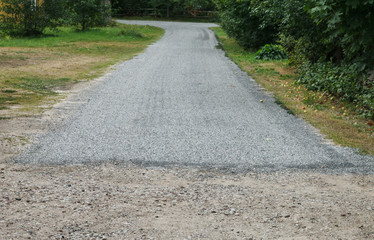 Asphalt and gravel road.