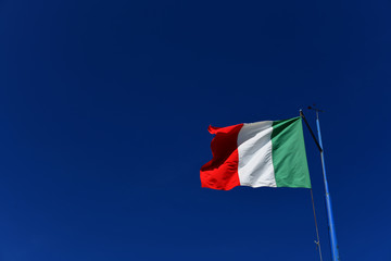 Naklejka na ściany i meble Waving Italian flag