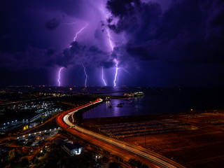 beautiful Lightning and light trail in highway at Singapore
