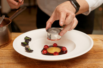 Chef is cooking gourmet dish
