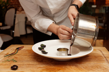 Chef is cooking gourmet dish