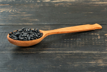 Black beans in spoon