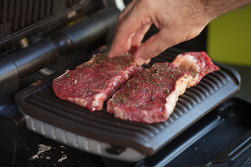 roast meat on electrical roaster close up