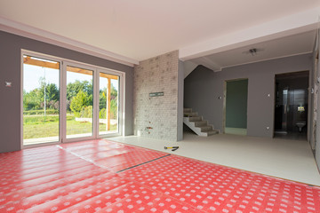 Living room with new laminated floor in the house