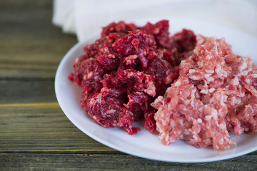 raw fresh meat minced pork and beef on a plate