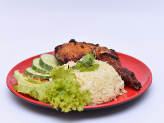 a set of a plate of chicken rice