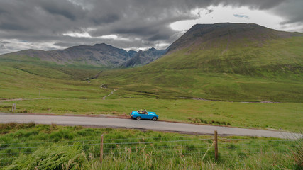 Blue car Cuillin Mountains