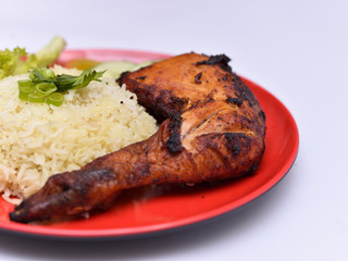 a set of a plate of chicken rice