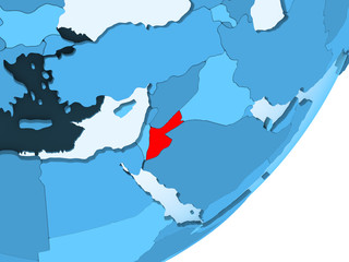 Map of Jordan on blue political globe