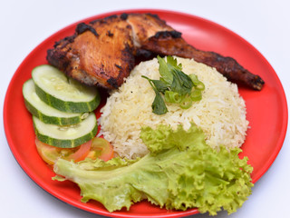 a set of a plate of chicken rice