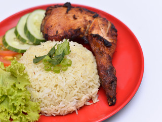 a set of a plate of chicken rice