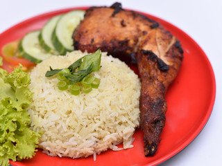 a set of a plate of chicken rice