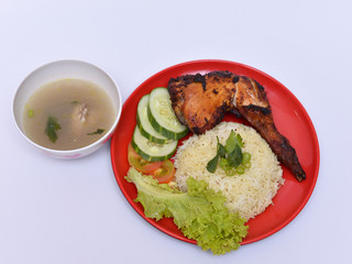 a set of a plate of chicken rice