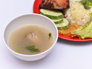a set of a plate of chicken rice