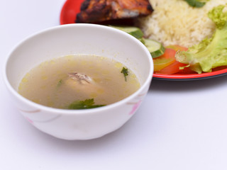 a set of a plate of chicken rice