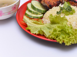 a set of a plate of chicken rice