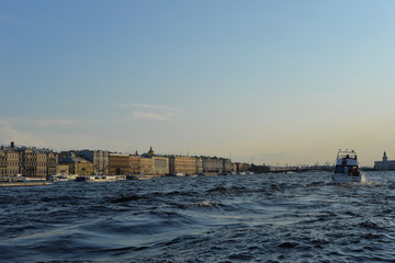 Boat and waves on the Neva River, Russia, St. Petersburg.