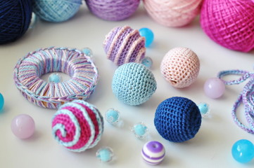 multi-colored knitted beads and yarn