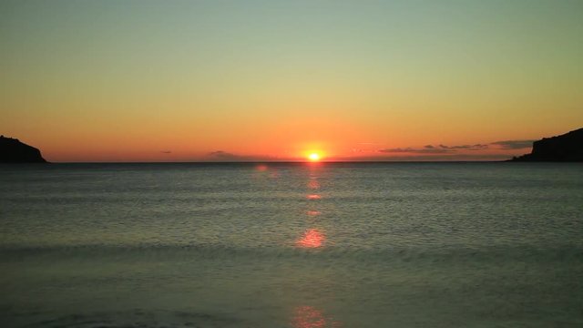 Scenic sunset over sea surface. Greece Peloponnese Lakonias Neo Itylo. Time lapse
