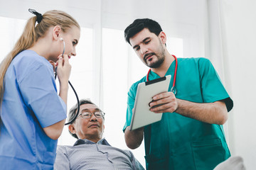 Doctor patient and nurse with tablet and stethoscope