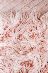 Pink fluffy fur background.  Flat lay, top view