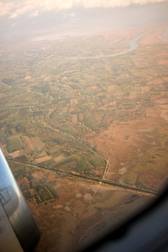 flying and traveling, view from airplane window on the wing