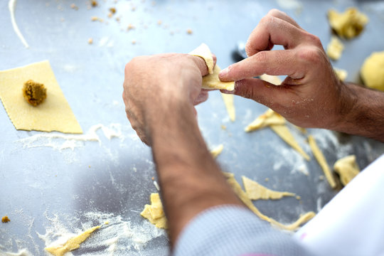Chef  prepared homemade raw tortellini pasta. Italian pasta,gluten-free