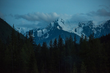 View on the night snowy peak, in the mountain in Altay
