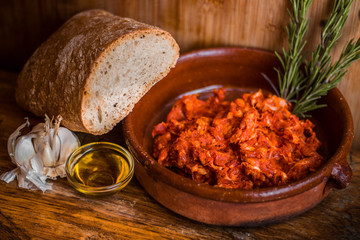 Picadillo beef hash with oil rosemary bread and garlic mediterranean spanish snack meal still life
