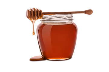 Honey in jar isolated on a white background