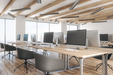 New coworking office with empty laptop