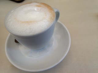milk foam in a cup of fres capuccino