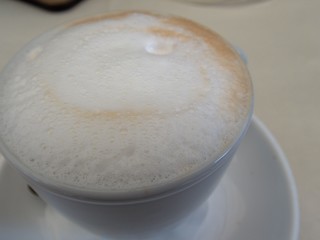 milk foam in a cup of fres capuccino