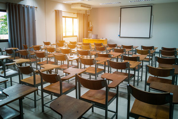 University classroom with many wooden chairs