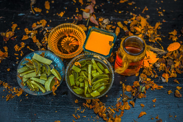 Face pack of aloevera,turmeric or haldi,honey,rose water for glowing and radiant skin for all types on wooden surface with all ingredients,Close up view.