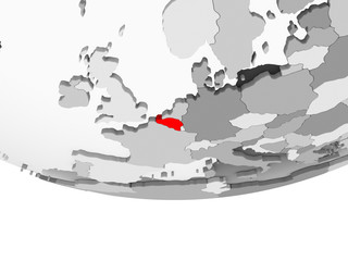 Map of Belgium on grey political globe