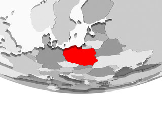 Map of Poland on grey political globe