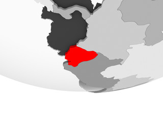 Map of Ecuador on grey political globe