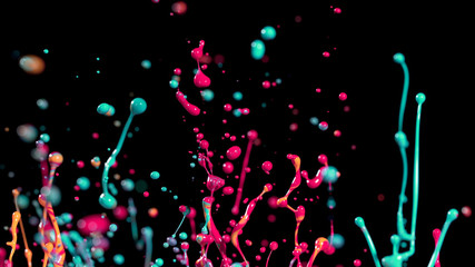 Abstract coloured paint splashes on black