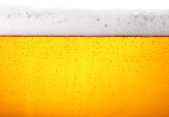 Close up background of beer with bubbles in glass - obrazy, fototapety, plakaty
