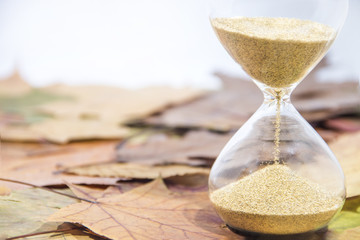 Daylight Saving Time. Wall Clock going to winter time. Autumn abstraction.