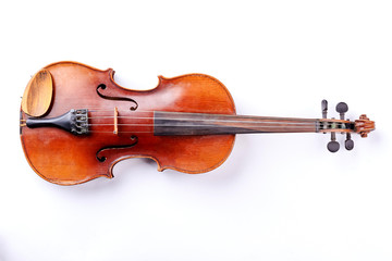 Violin isolated on white background. Studio shot of old violin. Classical musical instrument.