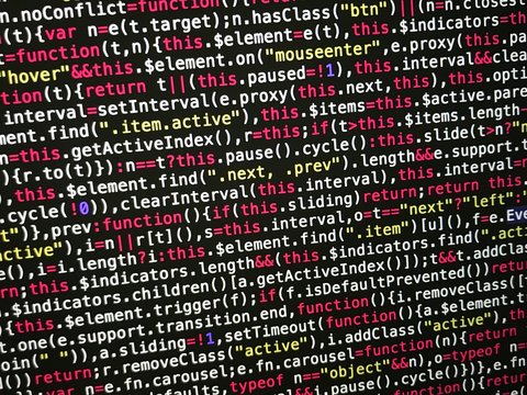 Screenshot of Javascript code. Colorful digital technology background