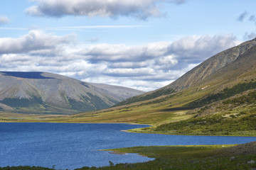Polar Urals, a summer landscape with mountains and a lake of Hadat.