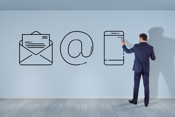 Businessman drawing thin line contact icon