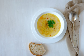 bowls of vegetable soup puree with cheese and seasonings, copy space