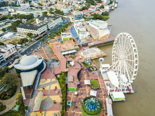 Aerial view of Guayaquil city, where the ferris wheel La Perla is located and Las Penas is in the...