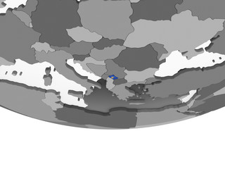 Kosovo with flag on globe