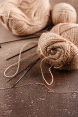 Fototapeta na wymiar Knitting wool and knitting needles, knitting equipment
